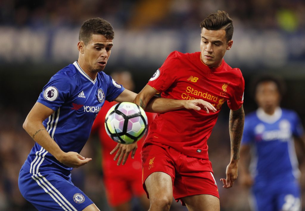 Chelsea's Oscar in action with Liverpool's Philippe Coutinho.