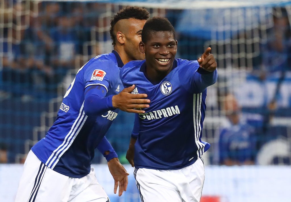 Schalke's Breel Embolo and Eric Maxim Choupo-Moting celebrate.