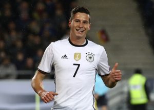 Germany's Julian Draxler celebrates scoring their first goal.