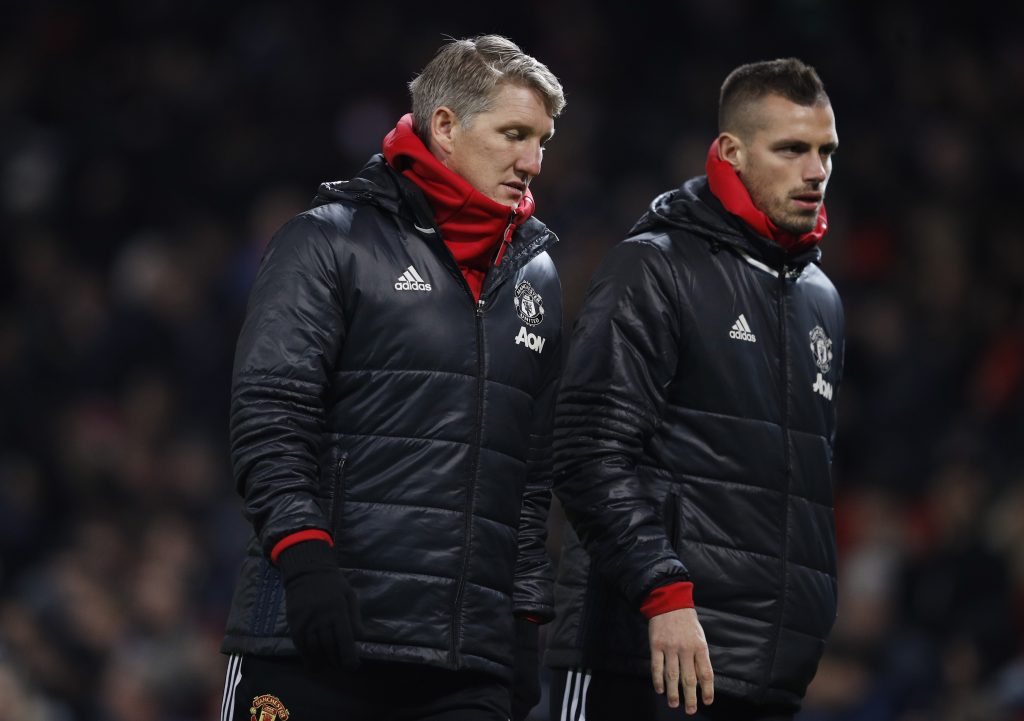 Bastian Schweinsteiger and Morgan Schneiderlin (R) at half time.
