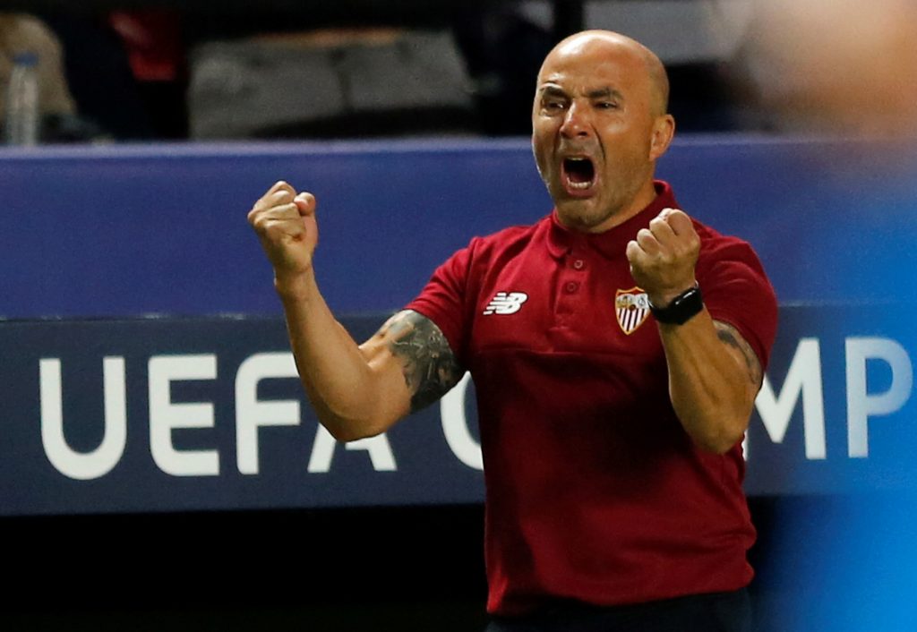 Sevilla's coach Jorge Sampaoli celebrates a goal against Dinamo Zagreb.