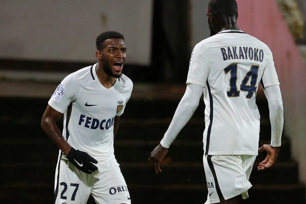 Thomas Lemar celebrates with his team mate Tiemoue Bakayoko.