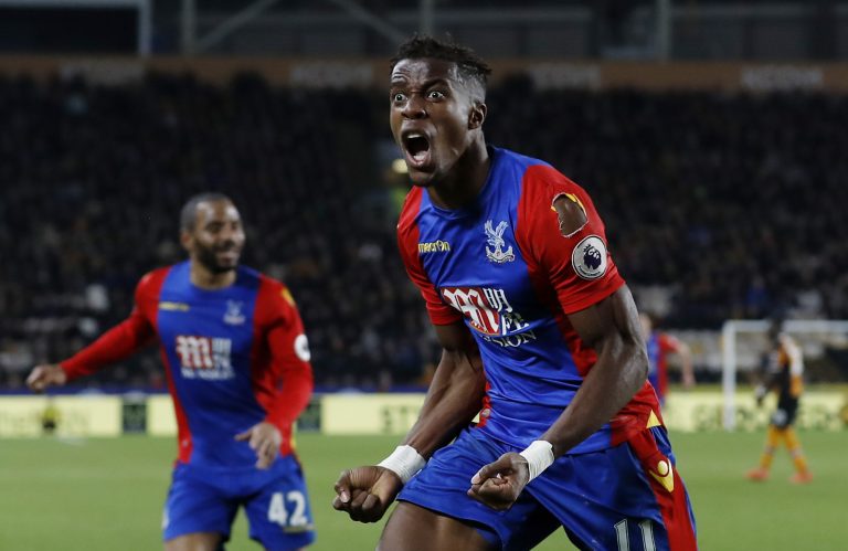 Wilfried Zaha celebrates.
