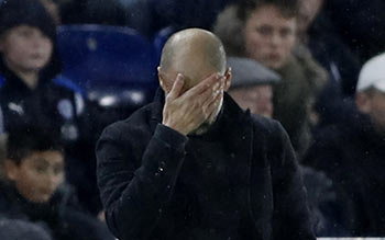 Pep Guardiola looks dejected