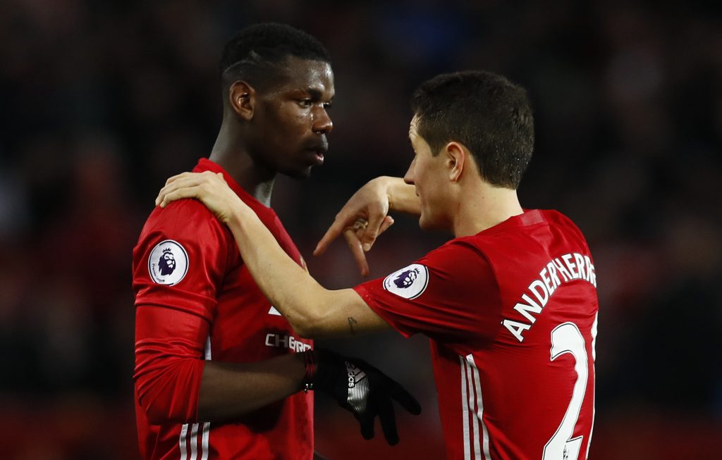 Paul Pogba speaks with Ander Herrera.