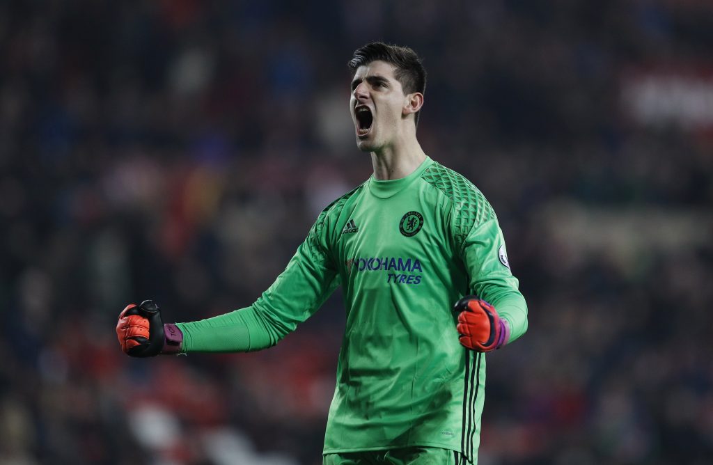 Thibaut Courtois celebrates after the game.