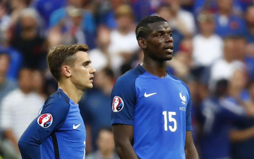 France's Antoine Griezmann and Paul Pogba.