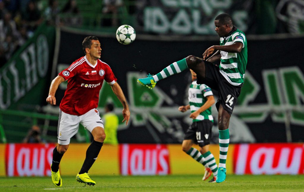 Sporting's William Carvalho in action with Legia's Tomasz Jodlowiec.