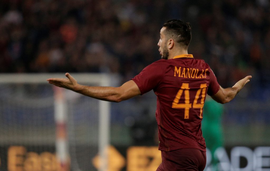 Kostas Manolas celebrates after scoring against Inter Milan.