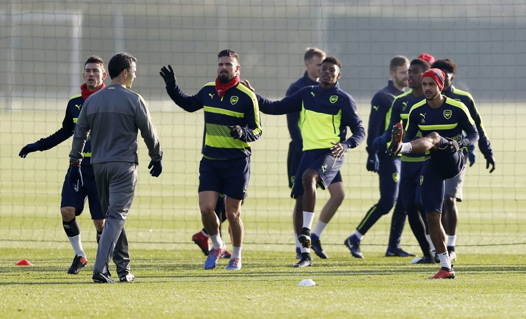 Arsenal's Laurent Koscielny, Olivier Giroud, Theo Walcott during training.