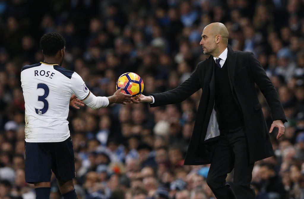 Manchester City manager Pep Guardiola and Tottenham's Danny Rose.