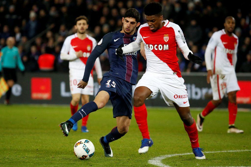AS Monaco's Nascimento challenges Paris Saint Germain's Goncalo Guedes.