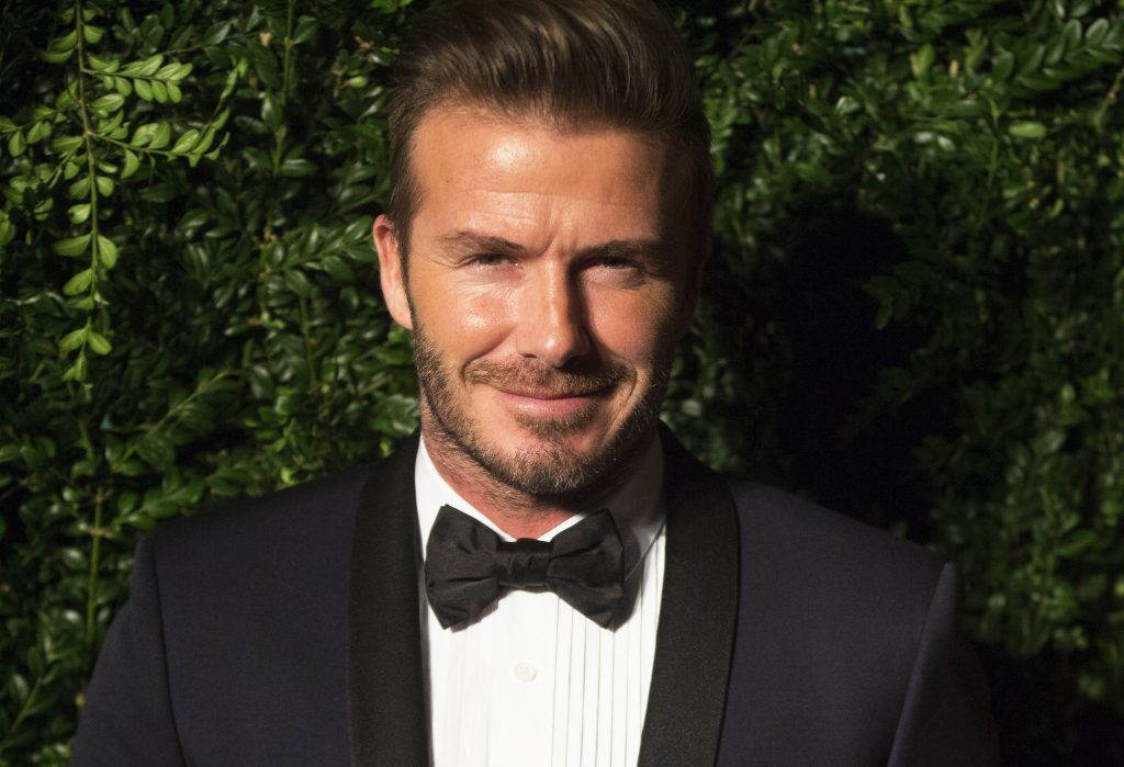 David Beckham smiles at the Evening Standard Theatre awards in London.