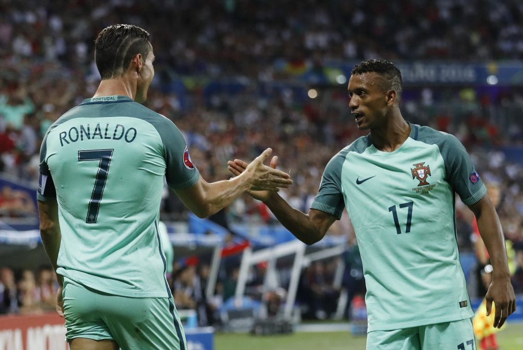 Portugal's Cristiano Ronaldo celebrates with Nani.
