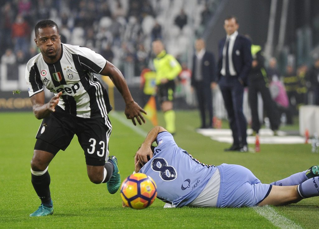 Patrice Evra in action against Sampdoria' Davide Biondini.