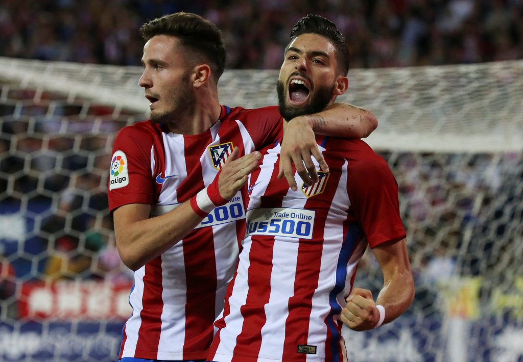 Yannick Carrasco (R) celebrates after scoring his second goal with team mate Saul Niguez.