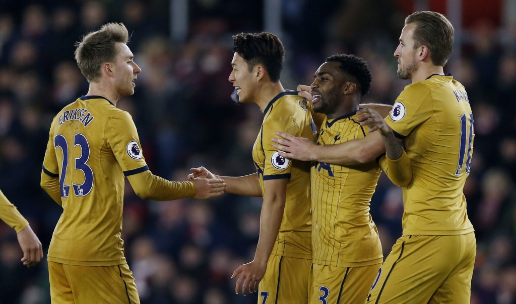 Tottenham's Son Heung-min celebrates scoring their third goal with teammates.