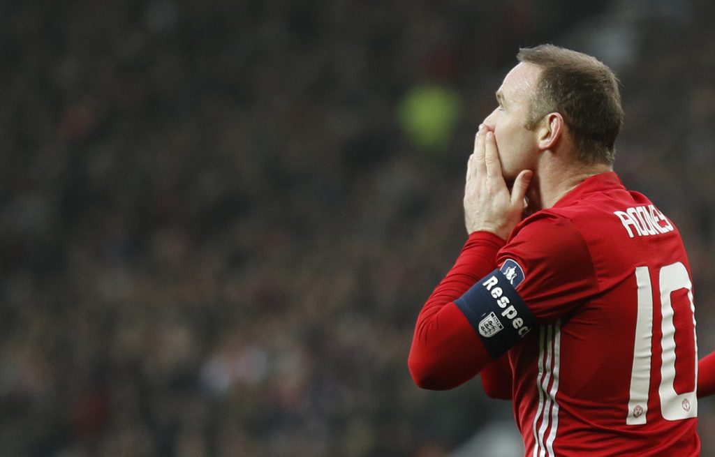 Wayne Rooney celebrates scoring.
