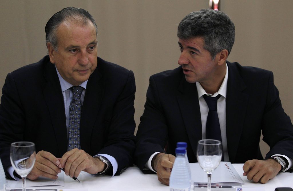 Villarreal's President Fernando Roig (L) and Atletico de Madrid's managing director Miguel Angel Gil.