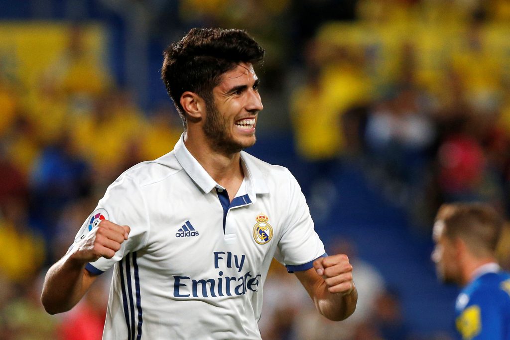 Real Madrid's Marco Asensio celebrates a goal during the match.
