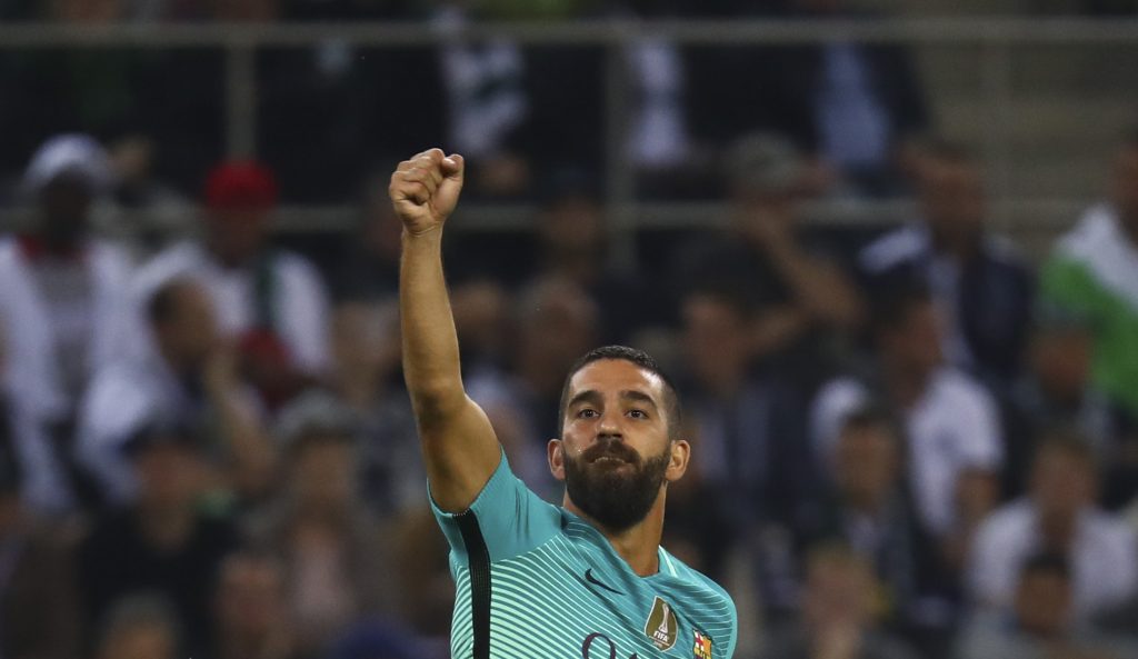 Barcelona's Arda Turan reacts.