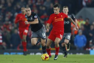 Liverpool's Philippe Coutinho in action with Southampton's Oriol Romeu.