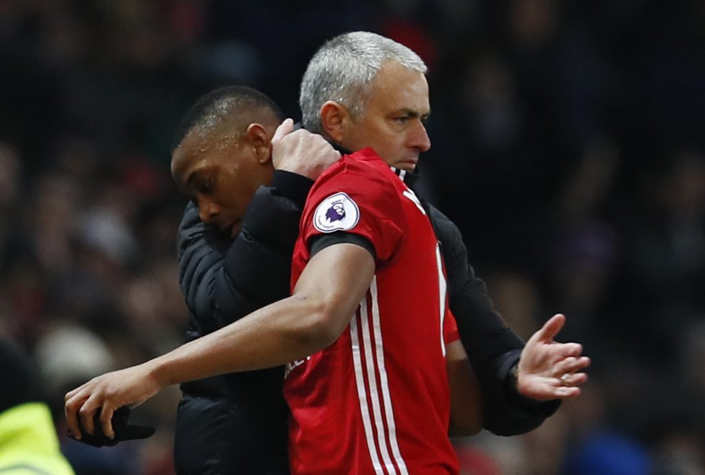 Anthony Martial is congratulated by manager Jose Mourinho as he is substituted.