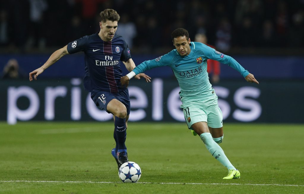 Barcelona's Neymar in action with Paris Saint-Germain's Thomas Meunier.