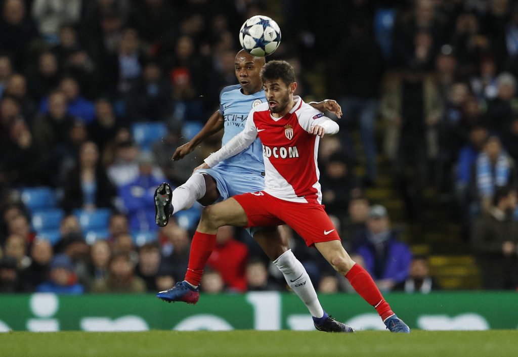 Manchester City's Fernandinho in action with Monaco's Bernardo Silva.