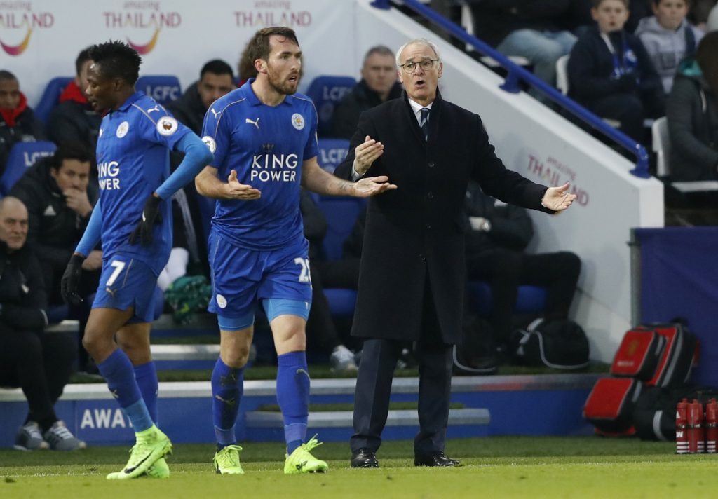 Leicester City manager Claudio Ranieri and Christian Fuchs react.