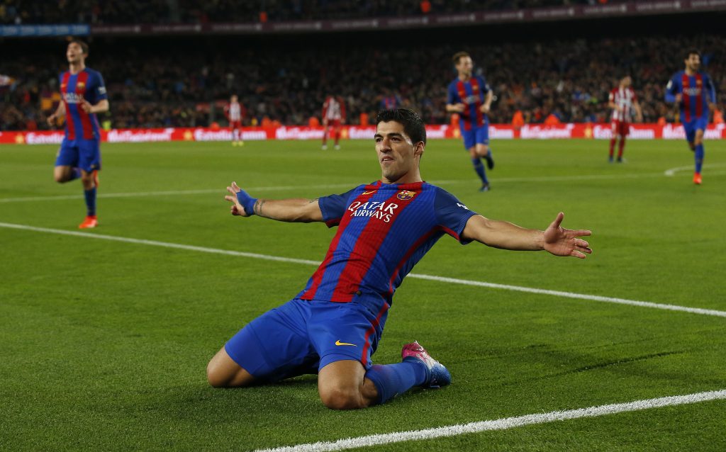 Barcelona's Luis Suarez celebrates after scoring their first goal.