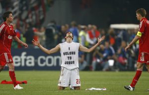 AC Milan's Kaka (C) falls to his knees after winning their Champions League final.
