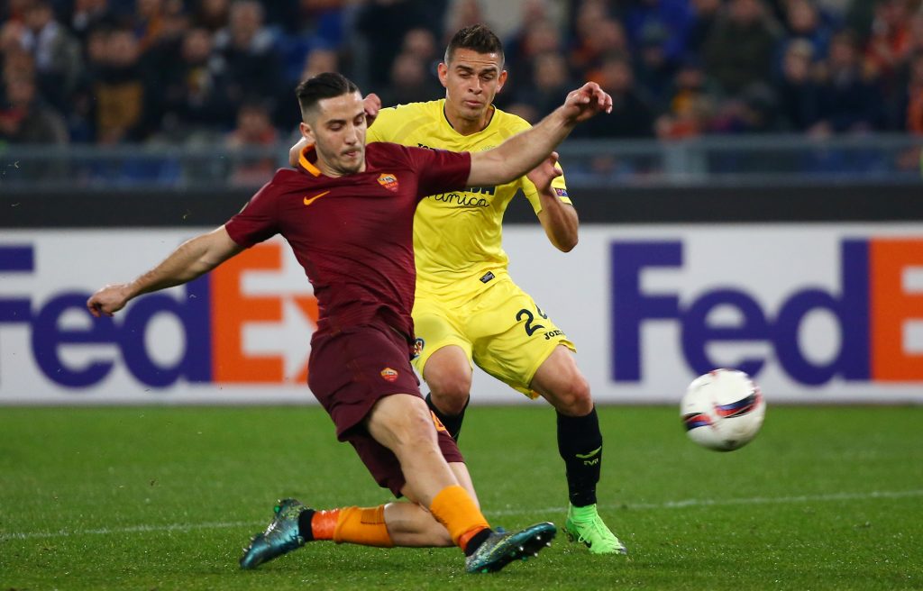 Roma's Kostas Manolas in action with Villarreal's Santos Borre.
