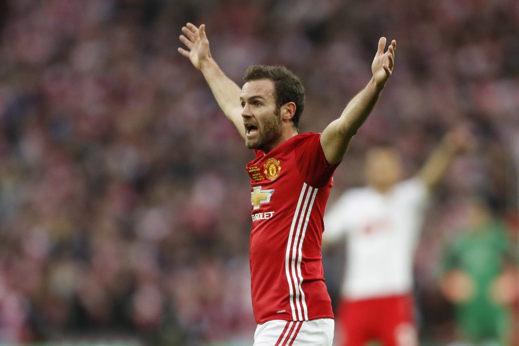 Manchester United's Juan Mata appeals for the goal to be disallowed for offside.