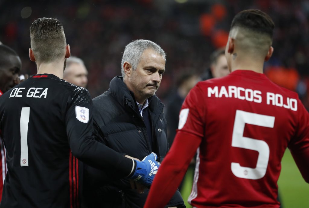 Manchester United manager Jose Mourinho with David De Gea and Marcos Rojo at the end of the match.