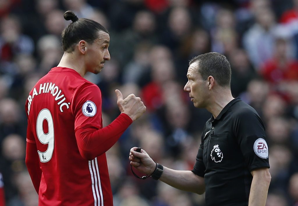 Zlatan Ibrahimovic speaks with referee Kevin Friend.