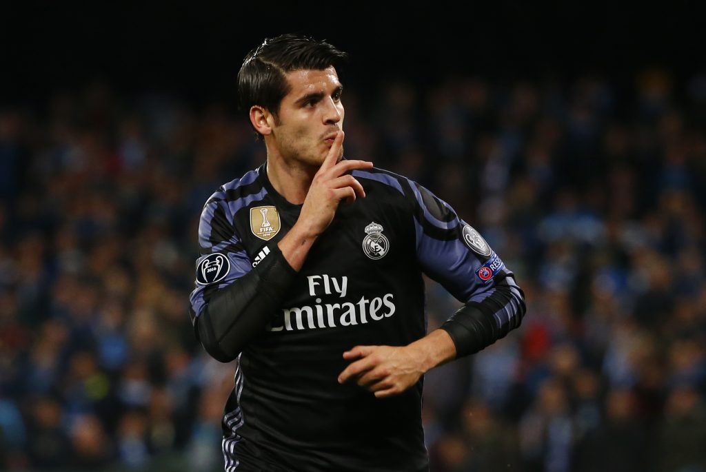 Real Madrid's Alvaro Morata celebrates scoring their third goal.