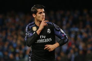 Real Madrid's Alvaro Morata celebrates scoring their third goal.