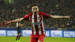 Atletico Madrid's Saul Niguez celebrates scoring their first goal.
