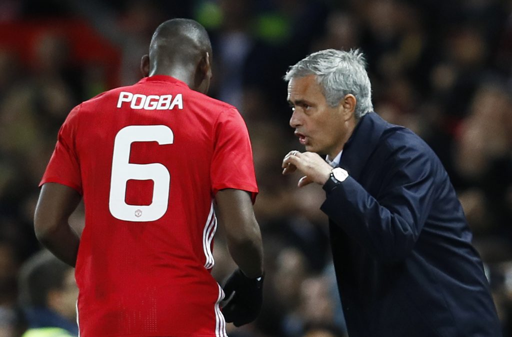 Manchester United manager Jose Mourinho with Manchester United's Paul Pogba.