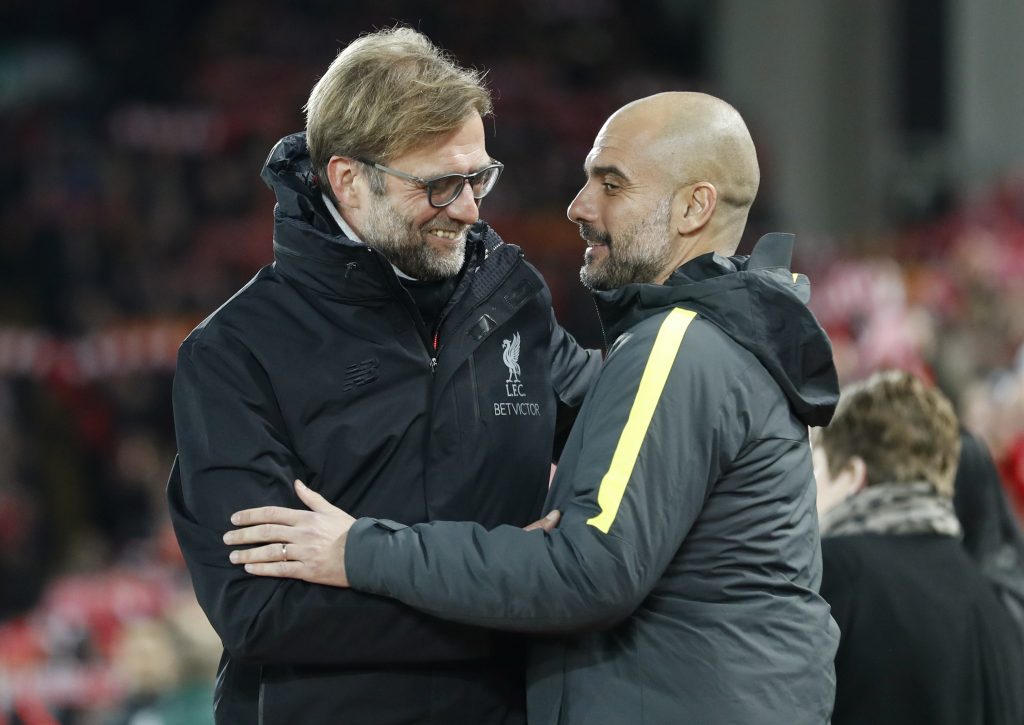 Manchester City manager Pep Guardiola with Liverpool manager Jurgen Klopp before the match.