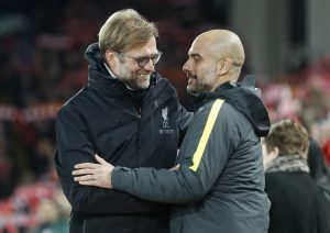 Manchester City manager Pep Guardiola with Liverpool manager Jurgen Klopp before the match.