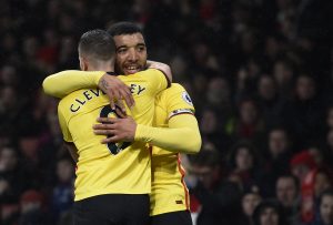 Watford's Troy Deeney celebrates scoring their second goal with Tom Cleverley.
