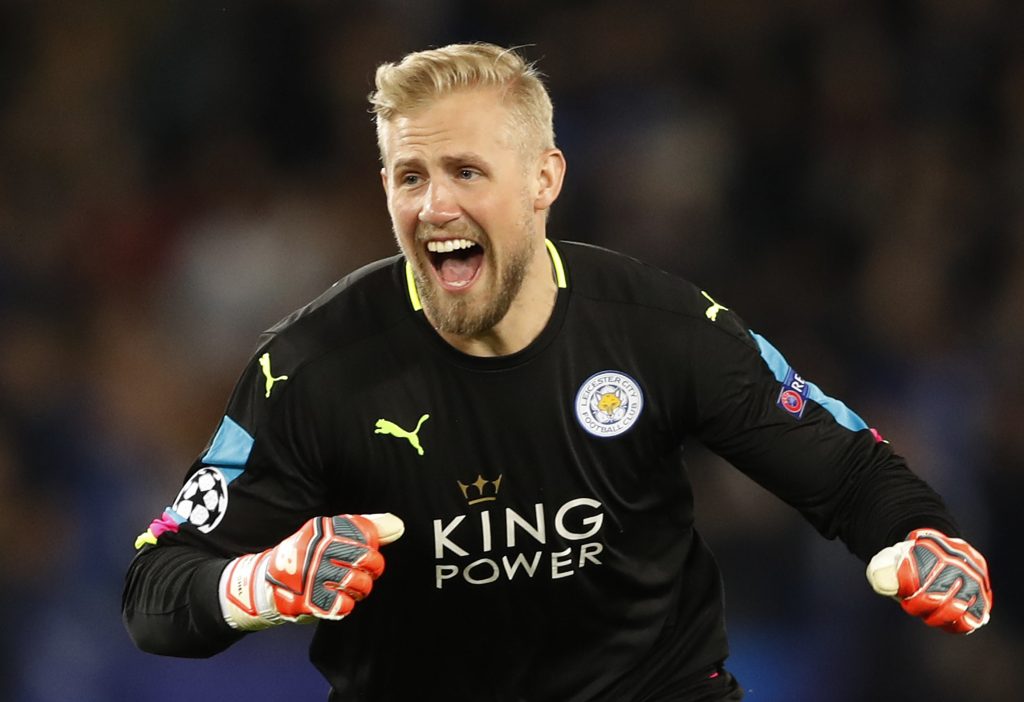 Leicester City's Kasper Schmeichel celebrates after Wes Morgan scores their first goal.