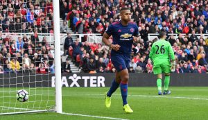 Antonio Valencia celebrates scoring.