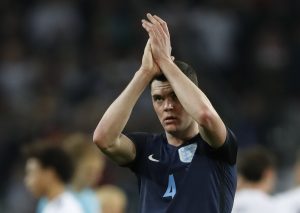England's Michael Keane applauds fans.