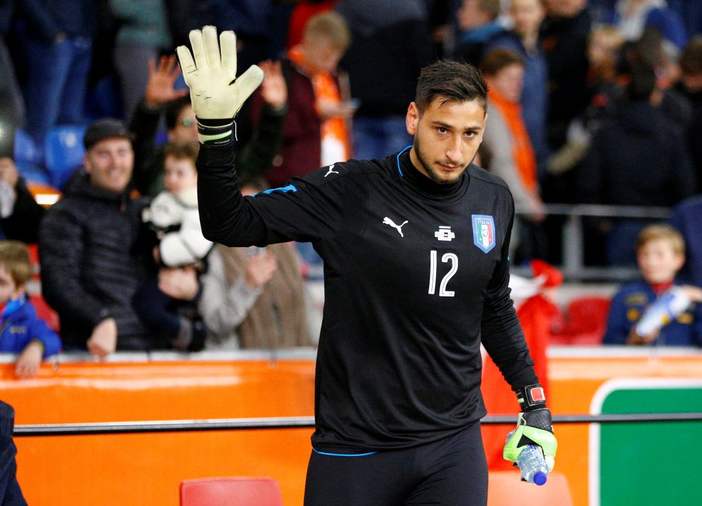 Italys goalkeeper Gianluigi Donnarumma gestures to fans after the match.