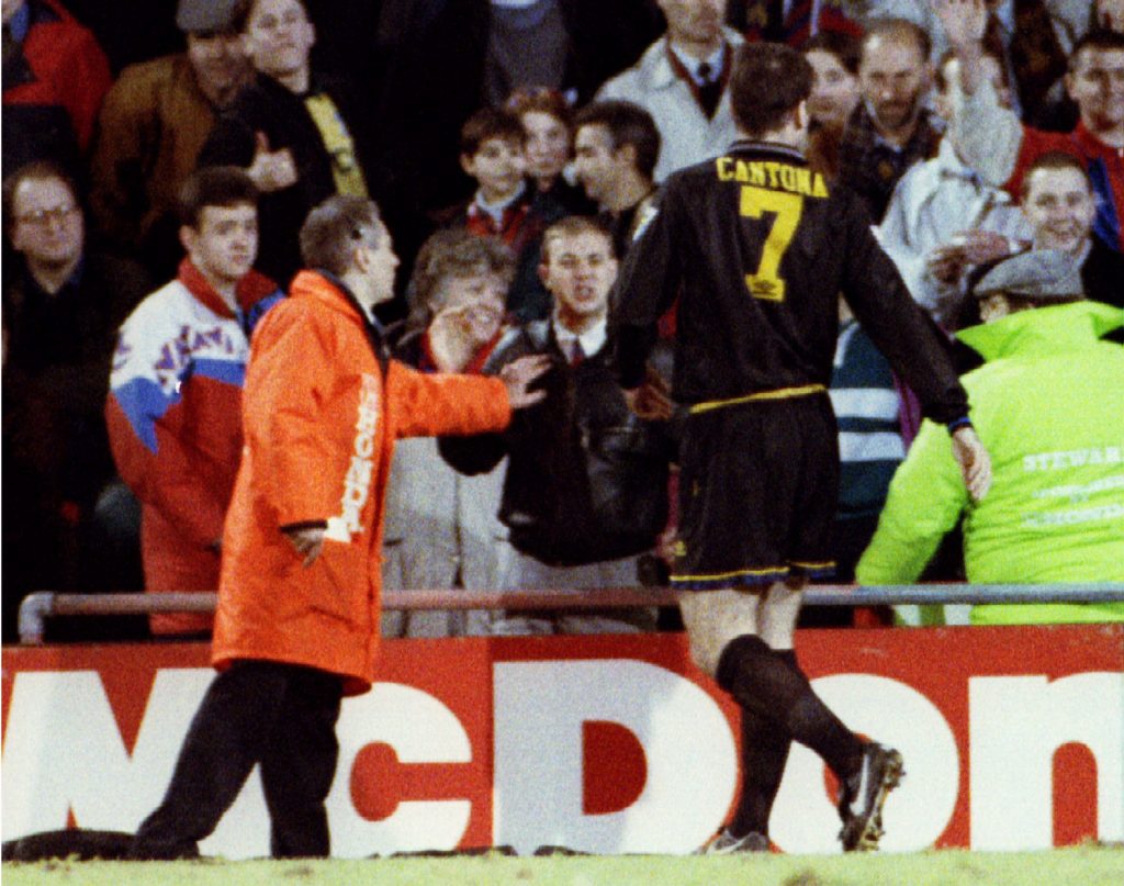 A Crystal Palace fan (C) shouts at Manchester United's French striker Eric Cantona.