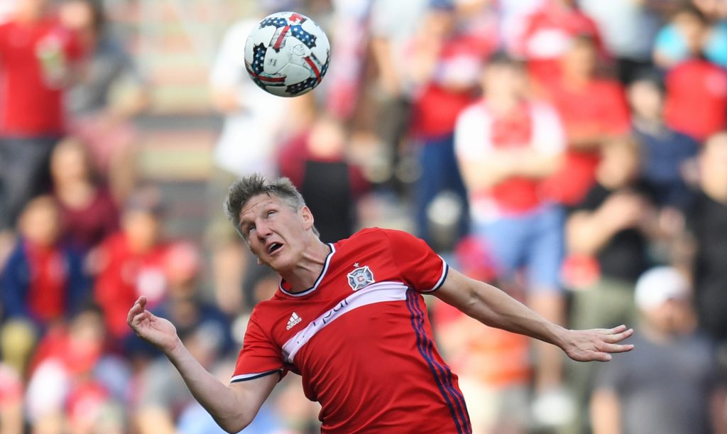 Chicago Fire midfielder Bastian Schweinsteiger (31) heads the ball in the first half against the New England Revolution at Toyota Park.