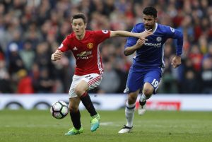 Manchester United's Ander Herrera in action with Chelsea's Diego Costa.